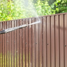 Fence Looking Tired? Soft Wash vs. Pressure for Fence Cleaning